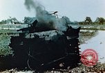 Standbild brennende japanische Typ 95 light Tanks Saipan Nördliche Marianen, 1944, aus Sekunde 32 historischem Filmmaterial Videoclip 65675028046