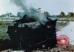 Standbild brennende japanische Typ 95 light Tanks Saipan Nördliche Marianen, 1944, aus Sekunde 34 historischem Filmmaterial Videoclip 65675028046