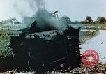 Standbild brennende japanische Typ 95 light Tanks Saipan Nördliche Marianen, 1944, aus Sekunde 35 historischem Filmmaterial Videoclip 65675028046