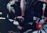 Image of Evacuating a wounded U.S. marine Saipan Northern Mariana Islands, 1944, second 1 stock footage video 65675028049