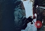 Image of Evacuating a wounded U.S. marine Saipan Northern Mariana Islands, 1944, second 3 stock footage video 65675028049