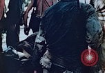 Image of Evacuating a wounded U.S. marine Saipan Northern Mariana Islands, 1944, second 4 stock footage video 65675028049