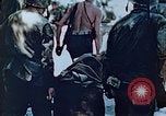 Image of Evacuating a wounded U.S. marine Saipan Northern Mariana Islands, 1944, second 5 stock footage video 65675028049