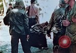 Image of Evacuating a wounded U.S. marine Saipan Northern Mariana Islands, 1944, second 6 stock footage video 65675028049