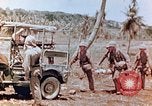 Image of Evacuating a wounded U.S. marine Saipan Northern Mariana Islands, 1944, second 9 stock footage video 65675028049