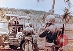Image of Evacuating a wounded U.S. marine Saipan Northern Mariana Islands, 1944, second 14 stock footage video 65675028049