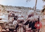 Image of Evacuating a wounded U.S. marine Saipan Northern Mariana Islands, 1944, second 15 stock footage video 65675028049