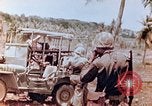 Image of Evacuating a wounded U.S. marine Saipan Northern Mariana Islands, 1944, second 16 stock footage video 65675028049