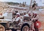 Image of Evacuating a wounded U.S. marine Saipan Northern Mariana Islands, 1944, second 18 stock footage video 65675028049