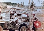 Image of Evacuating a wounded U.S. marine Saipan Northern Mariana Islands, 1944, second 21 stock footage video 65675028049