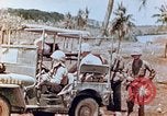 Image of Evacuating a wounded U.S. marine Saipan Northern Mariana Islands, 1944, second 22 stock footage video 65675028049