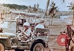 Image of Evacuating a wounded U.S. marine Saipan Northern Mariana Islands, 1944, second 23 stock footage video 65675028049