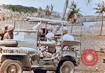 Image of Evacuating a wounded U.S. marine Saipan Northern Mariana Islands, 1944, second 24 stock footage video 65675028049