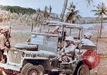 Image of Evacuating a wounded U.S. marine Saipan Northern Mariana Islands, 1944, second 25 stock footage video 65675028049