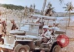 Image of Evacuating a wounded U.S. marine Saipan Northern Mariana Islands, 1944, second 26 stock footage video 65675028049