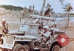 Image of Evacuating a wounded U.S. marine Saipan Northern Mariana Islands, 1944, second 27 stock footage video 65675028049