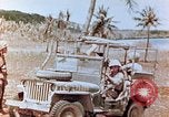 Image of Evacuating a wounded U.S. marine Saipan Northern Mariana Islands, 1944, second 29 stock footage video 65675028049