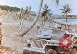 Image of Evacuating a wounded U.S. marine Saipan Northern Mariana Islands, 1944, second 31 stock footage video 65675028049