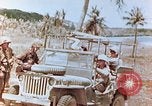 Image of Evacuating a wounded U.S. marine Saipan Northern Mariana Islands, 1944, second 33 stock footage video 65675028049