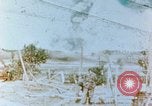 Image of U.S. Marines detonate demolition charge Saipan Northern Mariana Islands, 1944, second 1 stock footage video 65675028053
