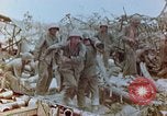 Image of U.S. marines set up camouflaged artillery  Saipan Northern Mariana Islands, 1944, second 15 stock footage video 65675028054