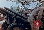 Image of U.S. marines set up camouflaged artillery  Saipan Northern Mariana Islands, 1944, second 24 stock footage video 65675028054