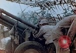 Image of U.S. marines set up camouflaged artillery  Saipan Northern Mariana Islands, 1944, second 26 stock footage video 65675028054