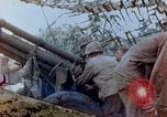 Image of U.S. marines set up camouflaged artillery  Saipan Northern Mariana Islands, 1944, second 27 stock footage video 65675028054