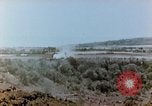 Image of U.S. marines set up camouflaged artillery  Saipan Northern Mariana Islands, 1944, second 28 stock footage video 65675028054