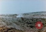 Image of U.S. marines set up camouflaged artillery  Saipan Northern Mariana Islands, 1944, second 29 stock footage video 65675028054