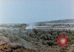 Image of U.S. marines set up camouflaged artillery  Saipan Northern Mariana Islands, 1944, second 30 stock footage video 65675028054
