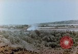 Image of U.S. marines set up camouflaged artillery  Saipan Northern Mariana Islands, 1944, second 31 stock footage video 65675028054