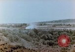 Image of U.S. marines set up camouflaged artillery  Saipan Northern Mariana Islands, 1944, second 32 stock footage video 65675028054