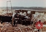 Image of Wrecked Japanese artillery pieces Saipan Northern Mariana Islands, 1944, second 7 stock footage video 65675028056