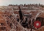 Image of Wrecked Japanese artillery pieces Saipan Northern Mariana Islands, 1944, second 14 stock footage video 65675028056
