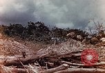 Standbild US Marine wirft Handgranate Saipan Nördliche Marianen, 1944, aus Sekunde 5 historischem Filmmaterial Videoclip 65675028058