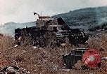 Image of Knocked out Japanese type 95 light tanks Saipan Northern Mariana Islands, 1944, second 20 stock footage video 65675028059
