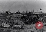 Image of wreckage in field Europe, 1918, second 9 stock footage video 65675028113
