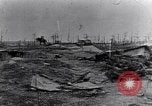 Image of wreckage in field Europe, 1918, second 10 stock footage video 65675028113