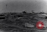 Image of wreckage in field Europe, 1918, second 12 stock footage video 65675028113