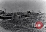 Image of wreckage in field Europe, 1918, second 13 stock footage video 65675028113