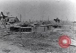 Image of wreckage in field Europe, 1918, second 14 stock footage video 65675028113