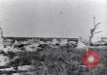Image of wreckage in field Europe, 1918, second 33 stock footage video 65675028113