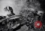 Image of British Mark I tank (male) followed by Allied troops France, 1916, second 5 stock footage video 65675028139