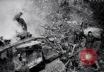 Image of British Mark I tank (male) followed by Allied troops France, 1916, second 6 stock footage video 65675028139