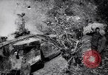 Image of British Mark I tank (male) followed by Allied troops France, 1916, second 7 stock footage video 65675028139