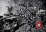 Image of British Mark I tank (male) followed by Allied troops France, 1916, second 8 stock footage video 65675028139