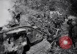Image of British Mark I tank (male) followed by Allied troops France, 1916, second 9 stock footage video 65675028139