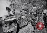 Image of British Mark I tank (male) followed by Allied troops France, 1916, second 10 stock footage video 65675028139