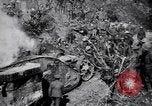Image of British Mark I tank (male) followed by Allied troops France, 1916, second 12 stock footage video 65675028139